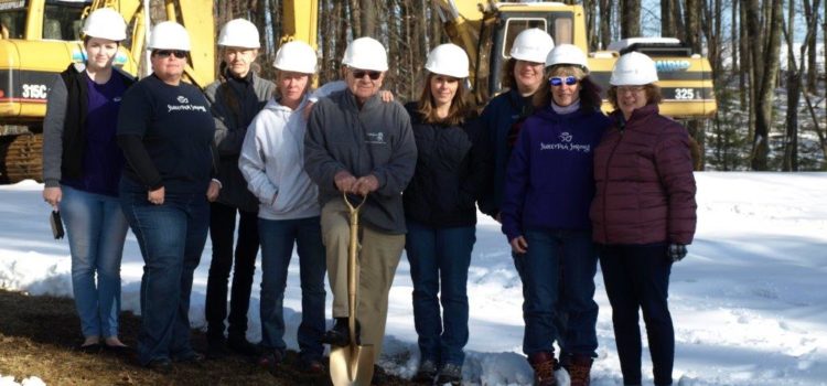 The Board of Directors celebrating groundbreaking for the new shelter.